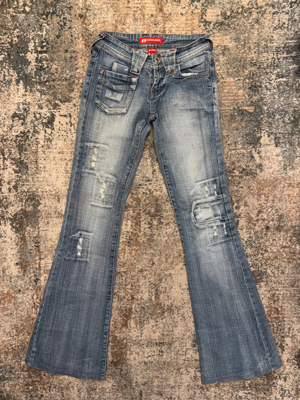 The Distressed Flare Denim